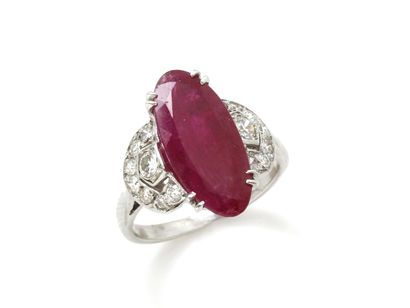 null Ring in white gold 750 thousandth, decorated with a ruby cut navette with edges...