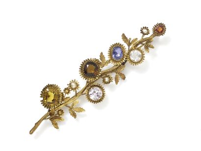 null A pompom brooch decorated with a flowering branch of a sapphire, a light pink...