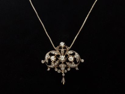null Pendant in silver 800 and gold 750 thousandths, with openwork decoration of...