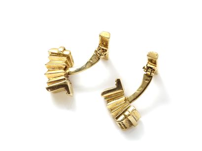 Pair of articulated cufflinks in gold 750...