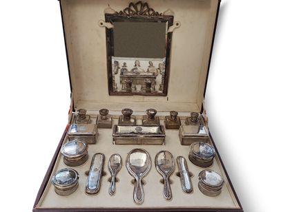 Silver and glass toilet service. France,...