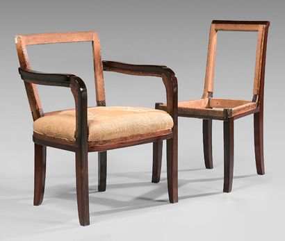 TRAVAIL FRANÇAIS 1930 Une chaise et un fauteuil en palissandre, fauteuil à accotoir...