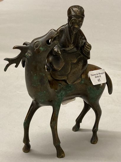 INDOCHINE Shoulao on his deer in bronze with brown patina and oxidations forming...