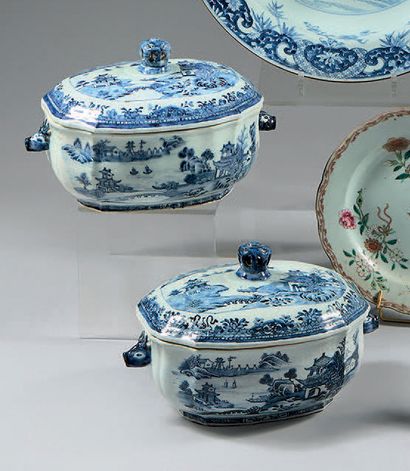 CHINE Two porcelain vegetable dishes and two lids of oval contoured form, with handles...