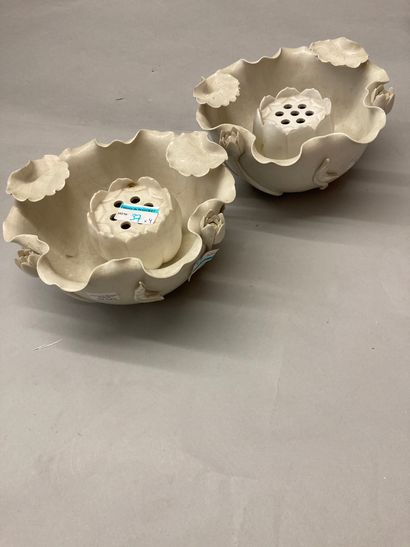 CHINE Two white porcelain cups in the shape of a lotus leaf with a lotus button (not...