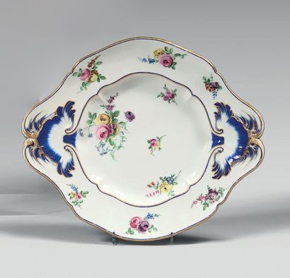 SÈVRES Tray of porcelain terrine. Mark in blue with the two interlaced L, letter...