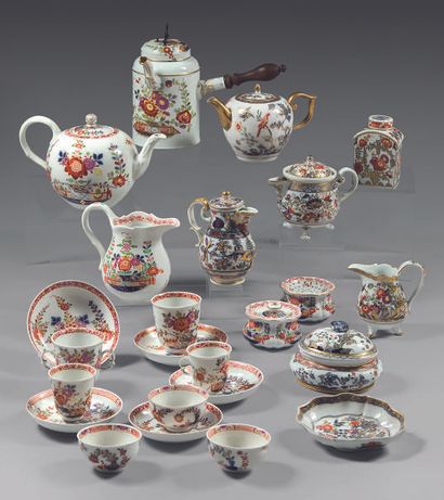 MEISSEN Two parts of porcelain service decorated in polychrome enhanced with gilding...