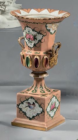 PARIS Octagonal porcelain Medici vase, the pedestal resting on a square foot, decorated...