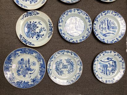 CHINE Set of nine circular porcelain plates, two of which are soup plates with various...