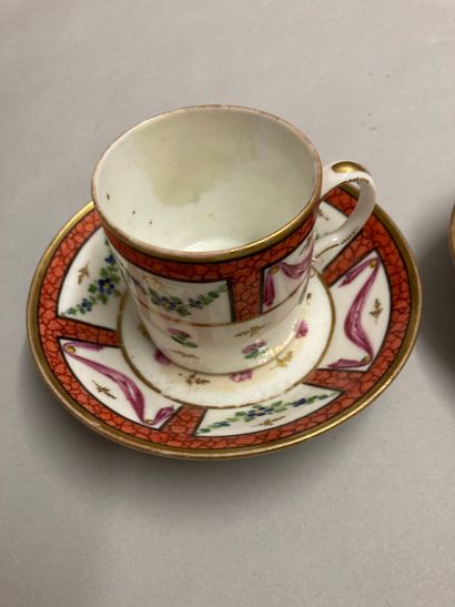 PARIS Pair of porcelain litron cups and their under cup decorated in polychromy and...