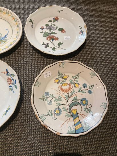 LA ROCHELLE et OUEST Six earthenware plates with various decorations of flowers,...