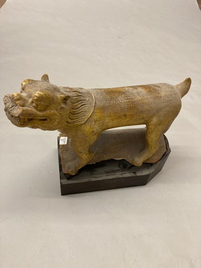 CHINE Ochre glazed earthenware ridge tile representing a standing Buddhist lion.
Ming...