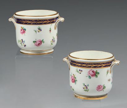 SÈVRES Pair of glass buckets in soft porcelain, the handles formed of scrolls, decorated...