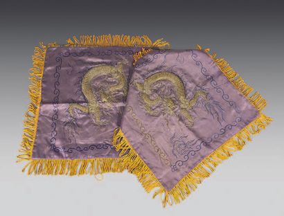 VIETNAM Two squares of mauve silk embroidered with gold threads of a dragon looking...