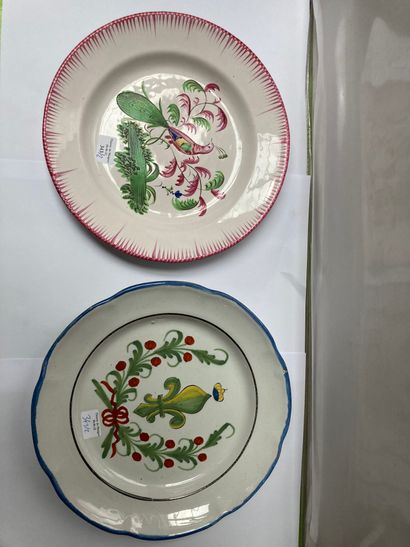 WALY et LES ISLETTES Two earthenware plates with polychrome decoration for one of...