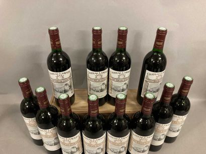null 12 bouteilles Château LAROQUE, St-Emilion 1986 (etlt, 2 etla, 4J, 5 TLB) cb