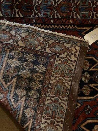 null Caucasian gallery carpet with black background and medallion decoration. Size:...