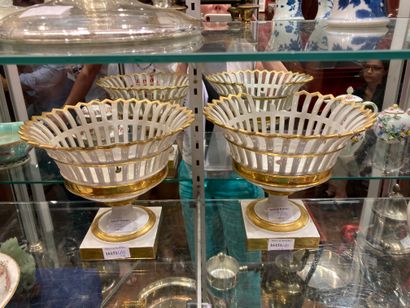 
2 openwork baskets in white and gold porcelain...