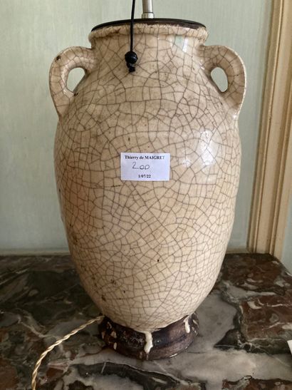 Ovoid lamp in cracked stoneware. Height:...