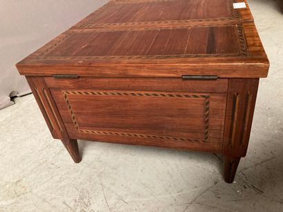 null Dressing table in rosewood veneer embellished with herringbone fillets; rectangular...