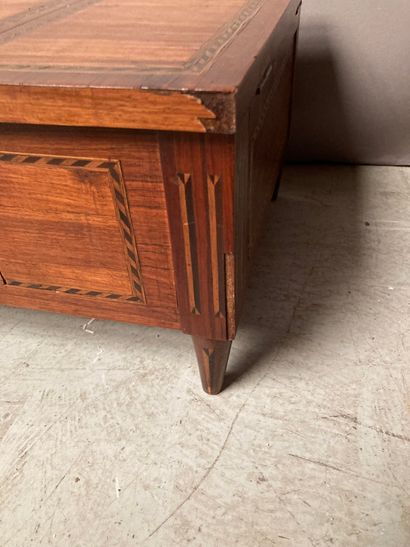 null Dressing table in rosewood veneer embellished with herringbone fillets; rectangular...