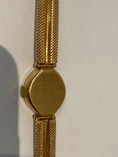 null Small lady's watch in gold 750°/°°. MABO SA

Gross weight : 18gr

2,80gr of...