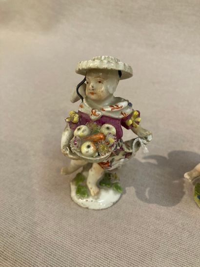 null MEISSENTrois porcelain figurines decorated in polychrome representing children...