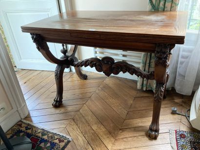 Table with X-shaped legs and lion miuffle

End...