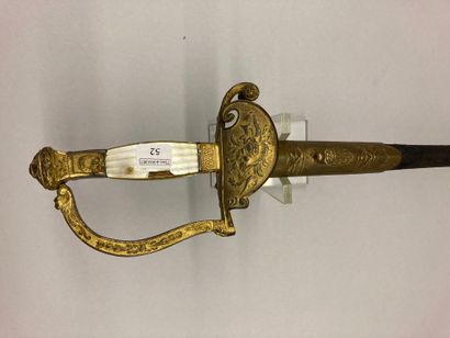 null Officer's sword, gilded brass keyboard guard decorated with a trophy of arms...