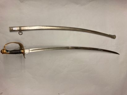  Cavalry officer's saber, bronze five-pointed guard with armorial cap surmounted...