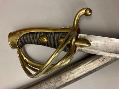  Light cavalry saber model year XI; three-pronged brass hilt, curved blade stamped,...