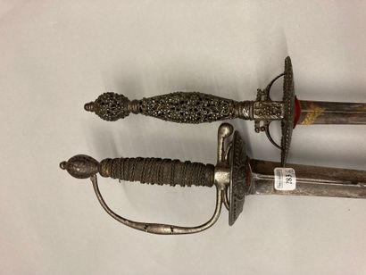 null A court sword, iron guard entirely pierced with circles and pearls decoration;...