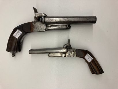  Two pinfire pistols, one small and one large, with double barrel in table. 
Length...