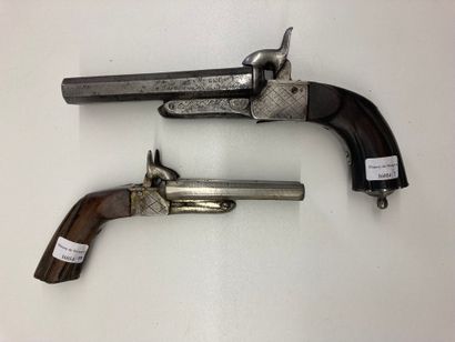  Two pinfire pistols, one small and one large, with double barrel in table. 
Length...
