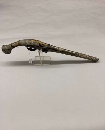 null Oriental flintlock pistol, silver plated metal trim decorated with scrolls,...