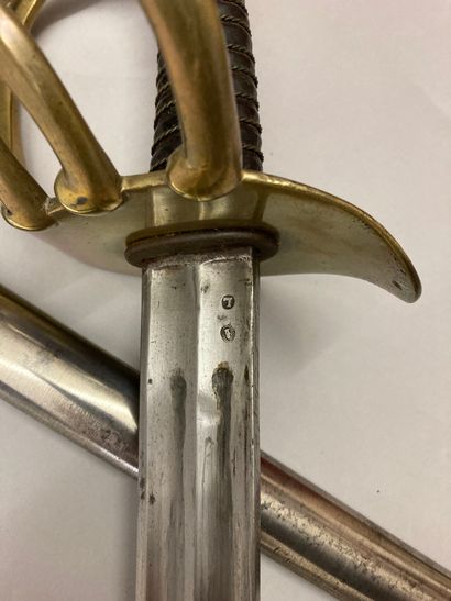  Large cavalry saber model year XI; brass guard stamped and stamped. Straight blade...