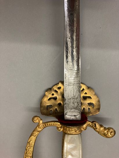 null Administration uniform sword, gilt brass guard, pierced keyboard, spindle with...