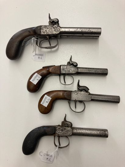 Four handguns with trunk, with percussion,...