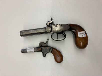 A double barrel percussion cap pistol with...