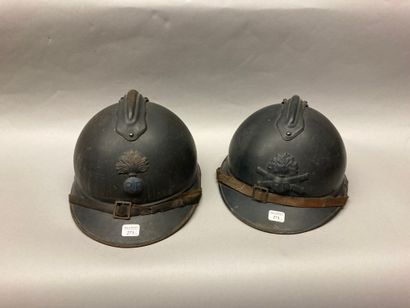 Two 1915 Adrian helmets, one infantry, the...