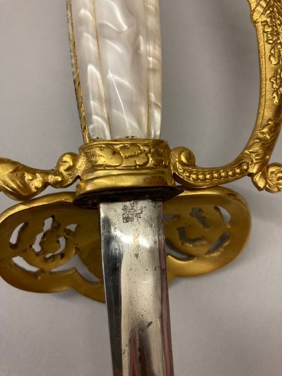 null Uniform sword of the Ecole des Mines, chased and gilded brass guard, pierced...