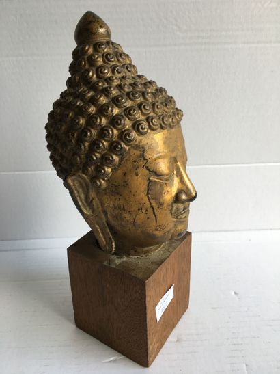 null Tête de bouddha en métal doré dasn le goût des productions d'Asie du Sud Est...