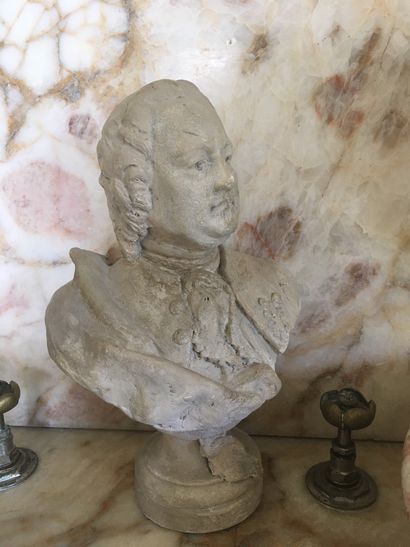 Plaster bust on pedestal representing a man...
