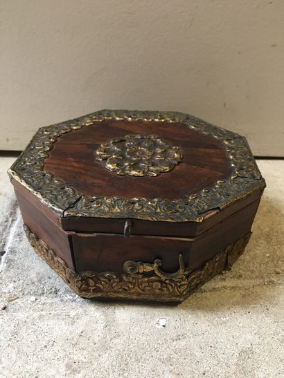 Octagonal box in olive tree with decoration...