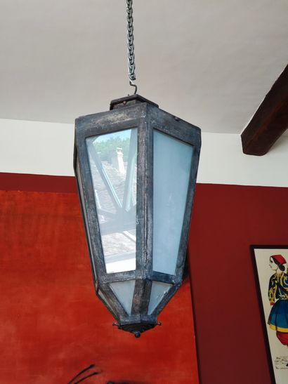null Pair of patinated metal lanterns with cut sides, glass missing