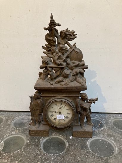 Regula clock with brown patina surmounted...