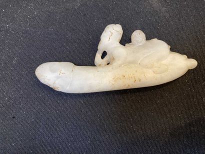 Hard stone fibula carved with characters,...