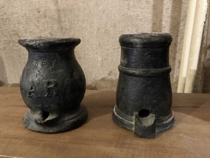 null Two cast iron fire pots, one monogrammed AR. Size: 16 cm. 

Worn