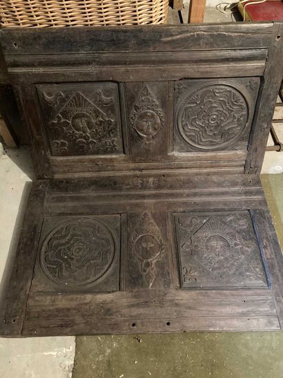 Two carved wood panels decorated with roses,...