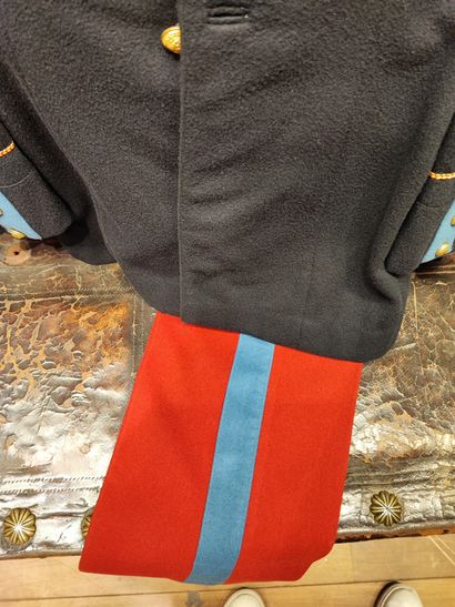 null A khaki military jacket, a uniform of the military school of Saint-Cyr in blue...